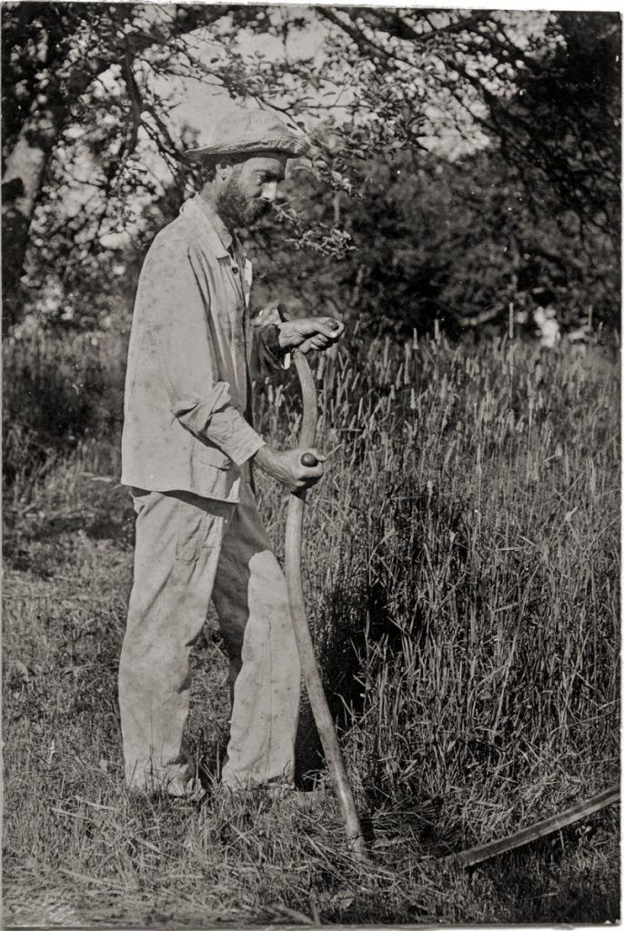 Lewis W. Hine: Man with Scythe