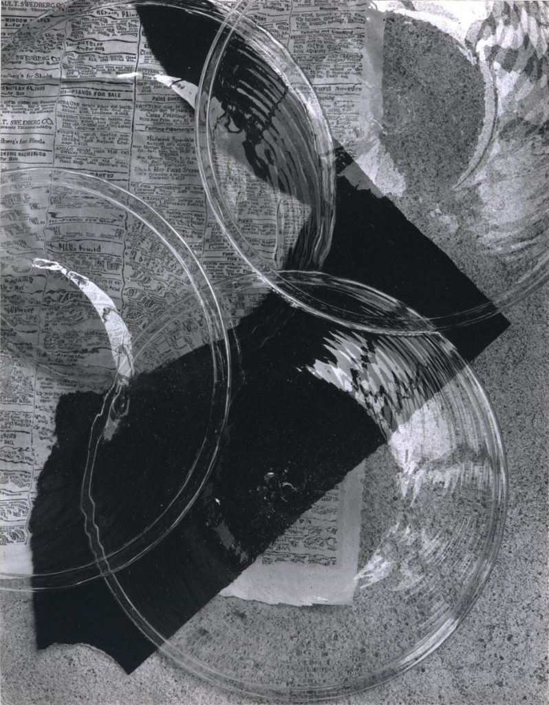 Donald Ross: Still Life — Glass Plates and Newspaper